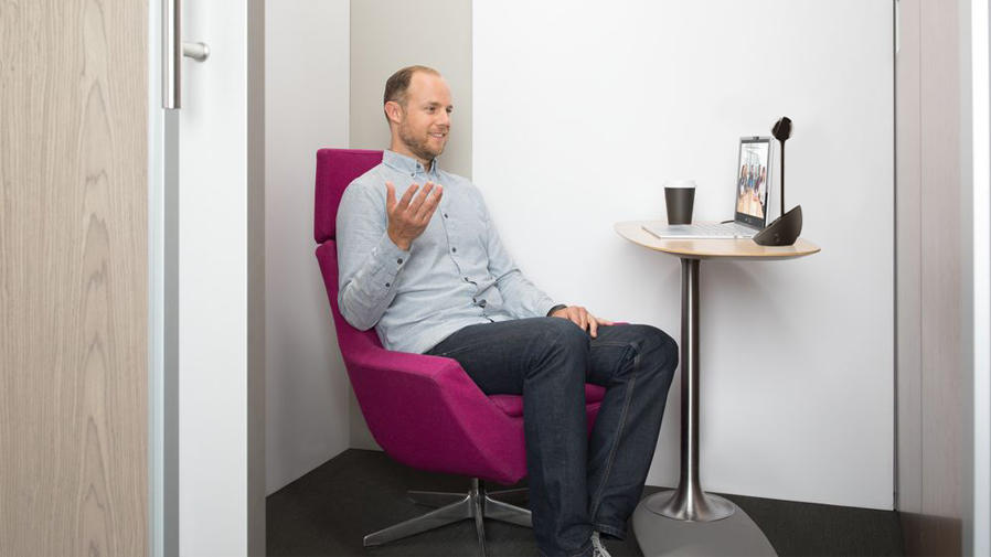 Man video conferencing on his laptop